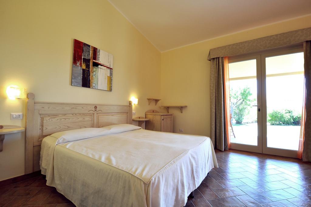 Affittacamere B&B La Villa Dei Graniti Вилласимиус Номер фото